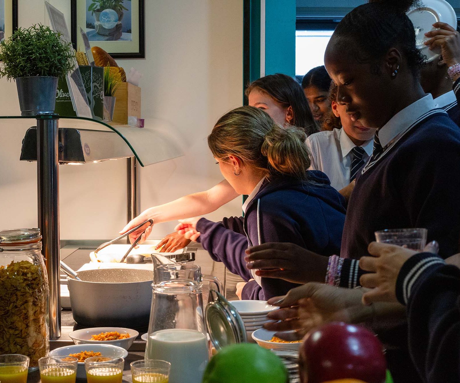 children getting breakfast