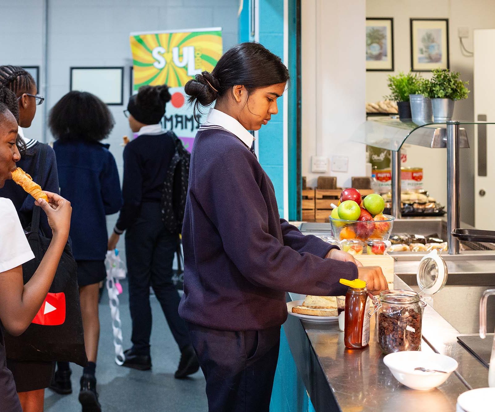 children getting breakfast