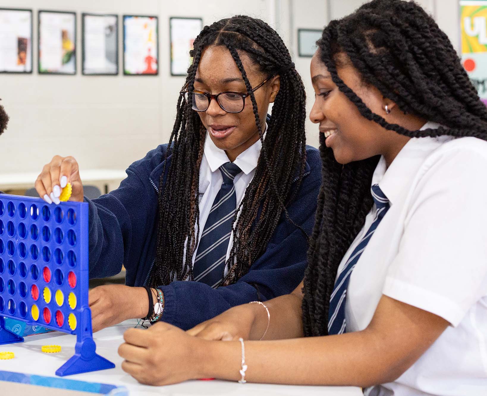 schoolchildren playing games at breakfast