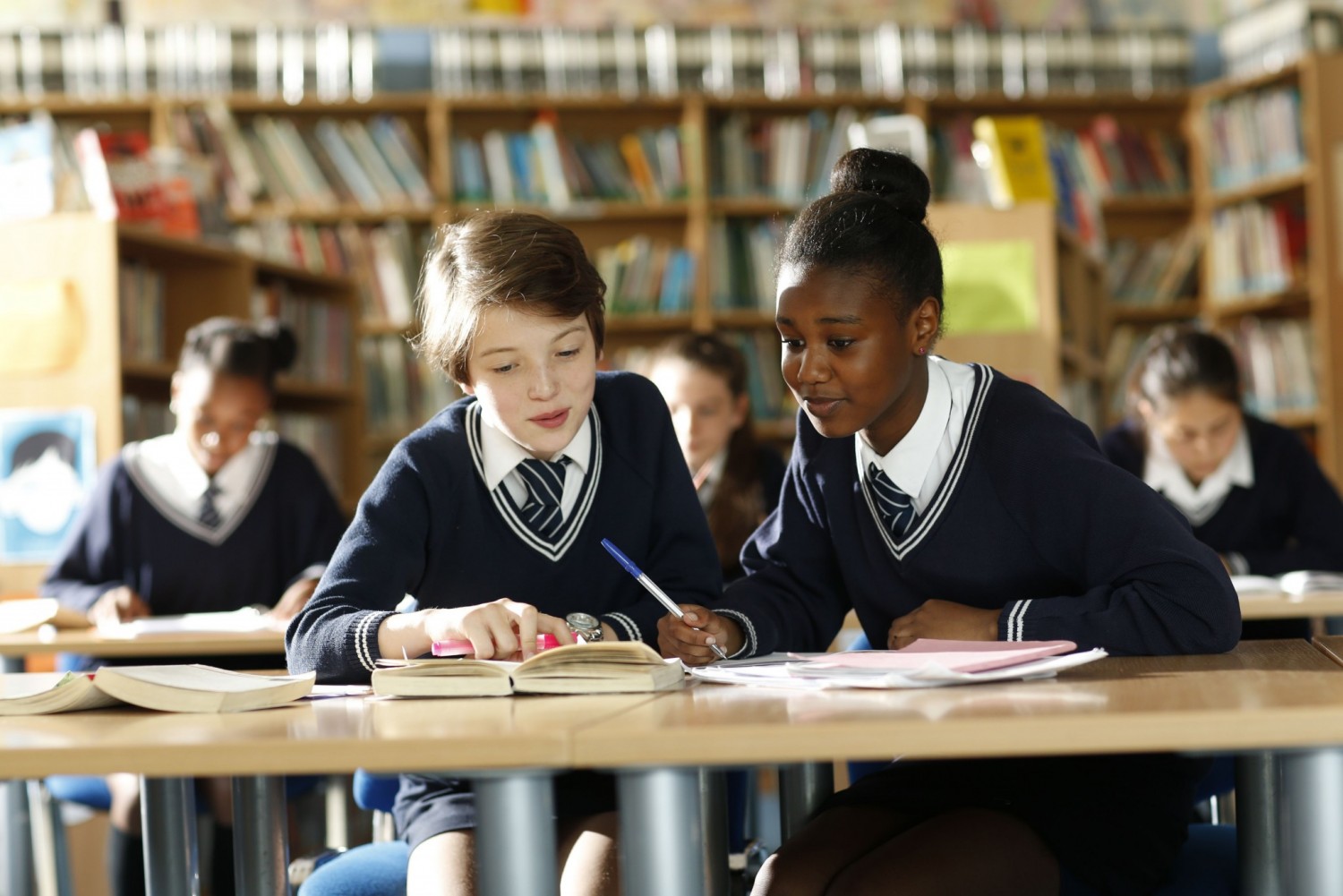 pupils working together in a class room