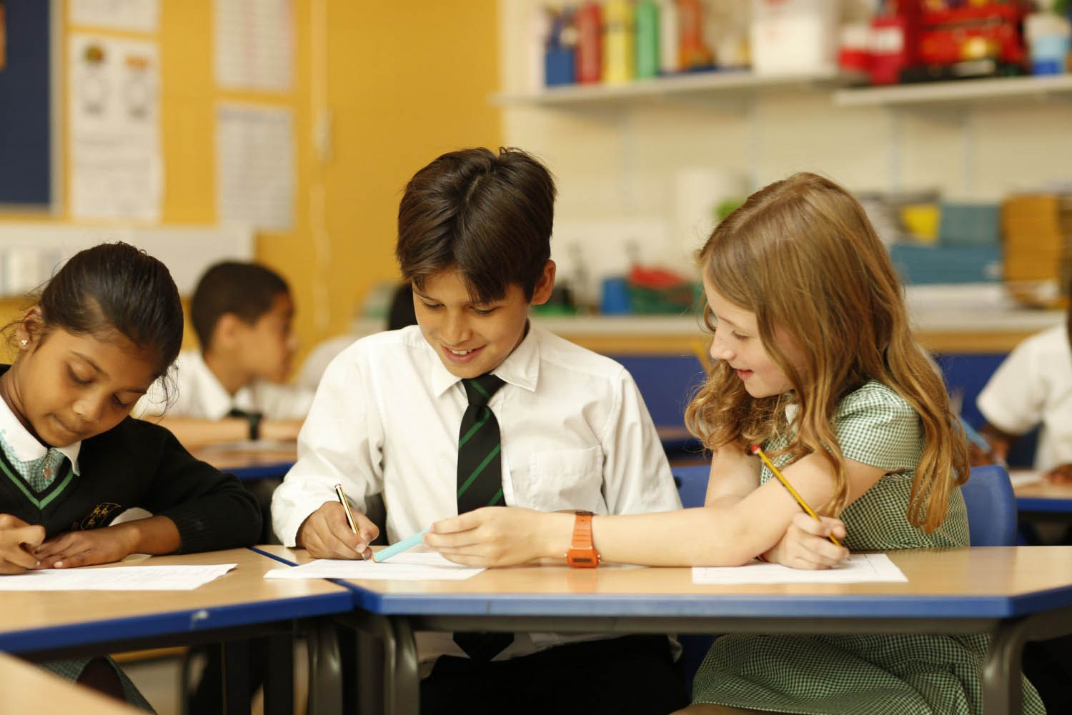 school children working in a class room