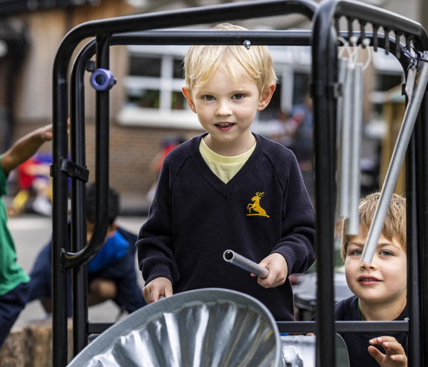 schoolchildren on a climbing frame
