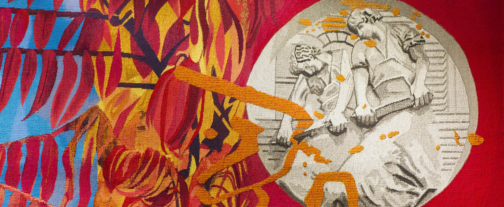A tapestry showing a roundel of a flesher at work surrounded by botanicals used in the tanning process.