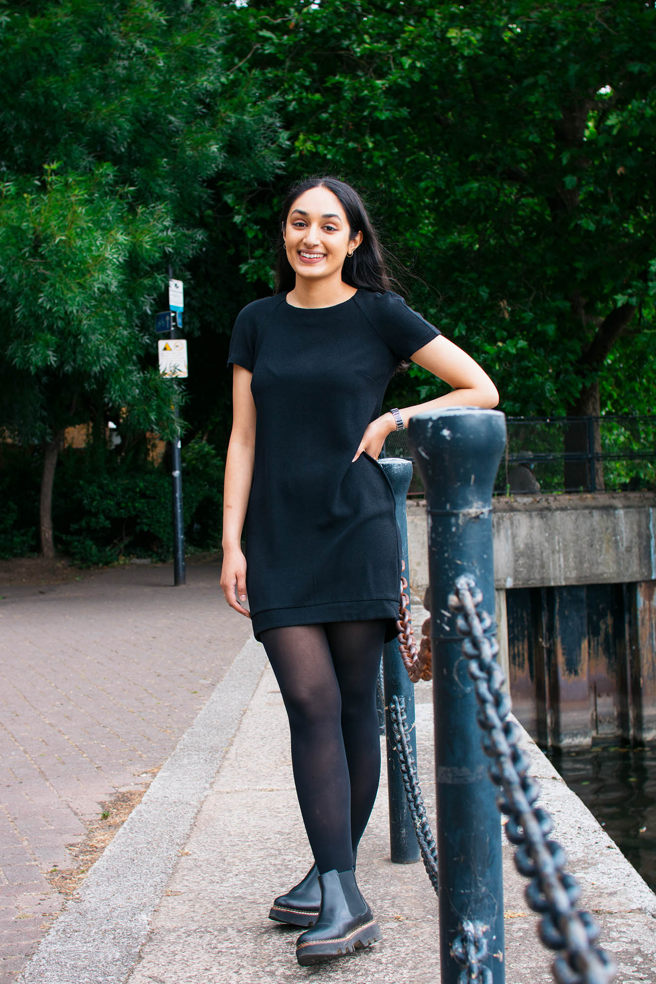 portrait of a woman by a railing