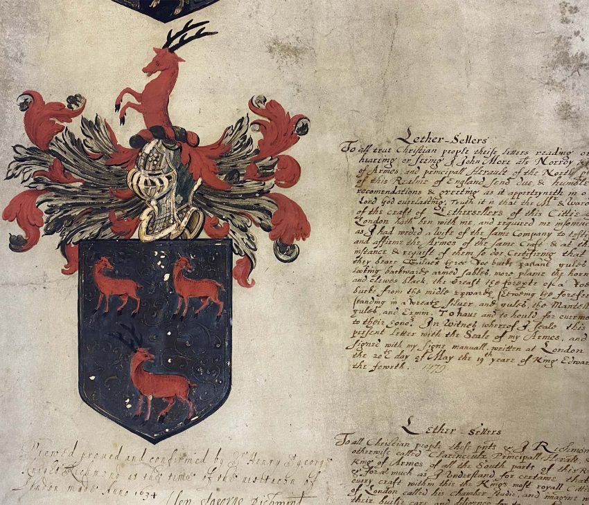 heraldic image depicting three roebucks in a black shield