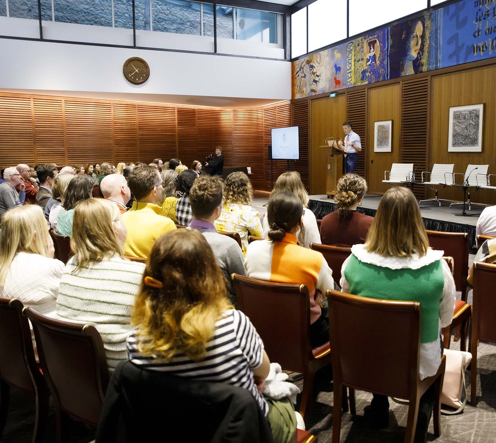 man speaking at an event
