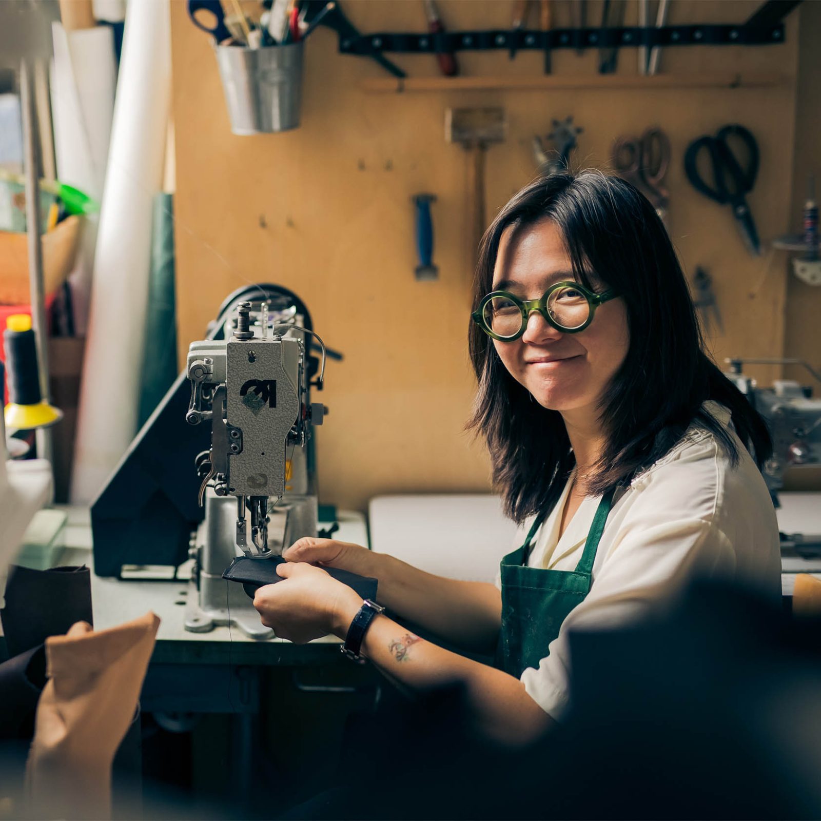 woman on sewing machine