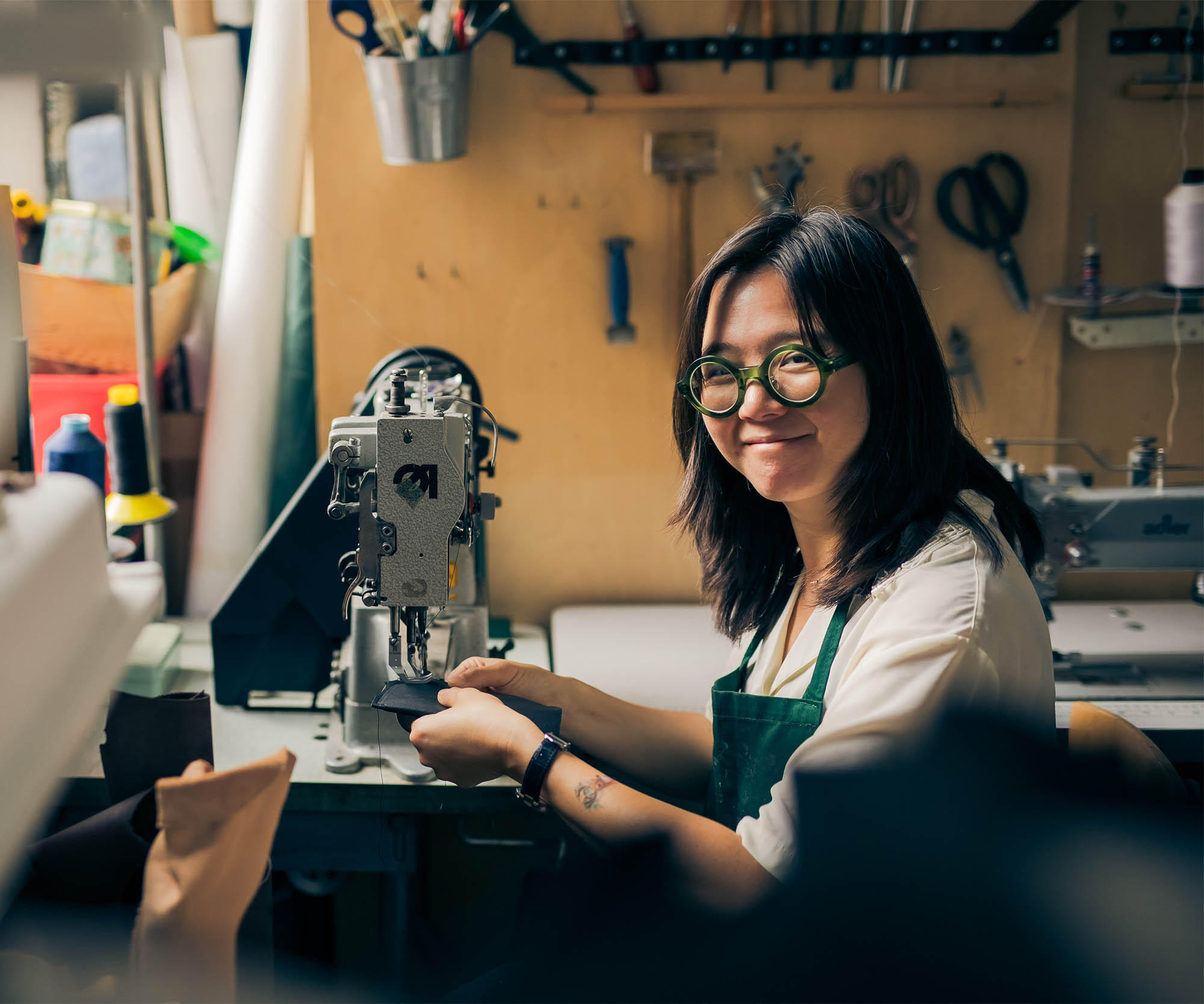 woman on sewing machine