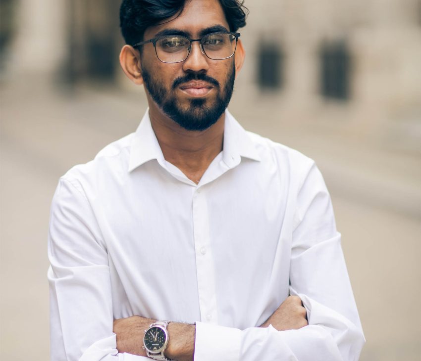 man with a white shirt and glasses