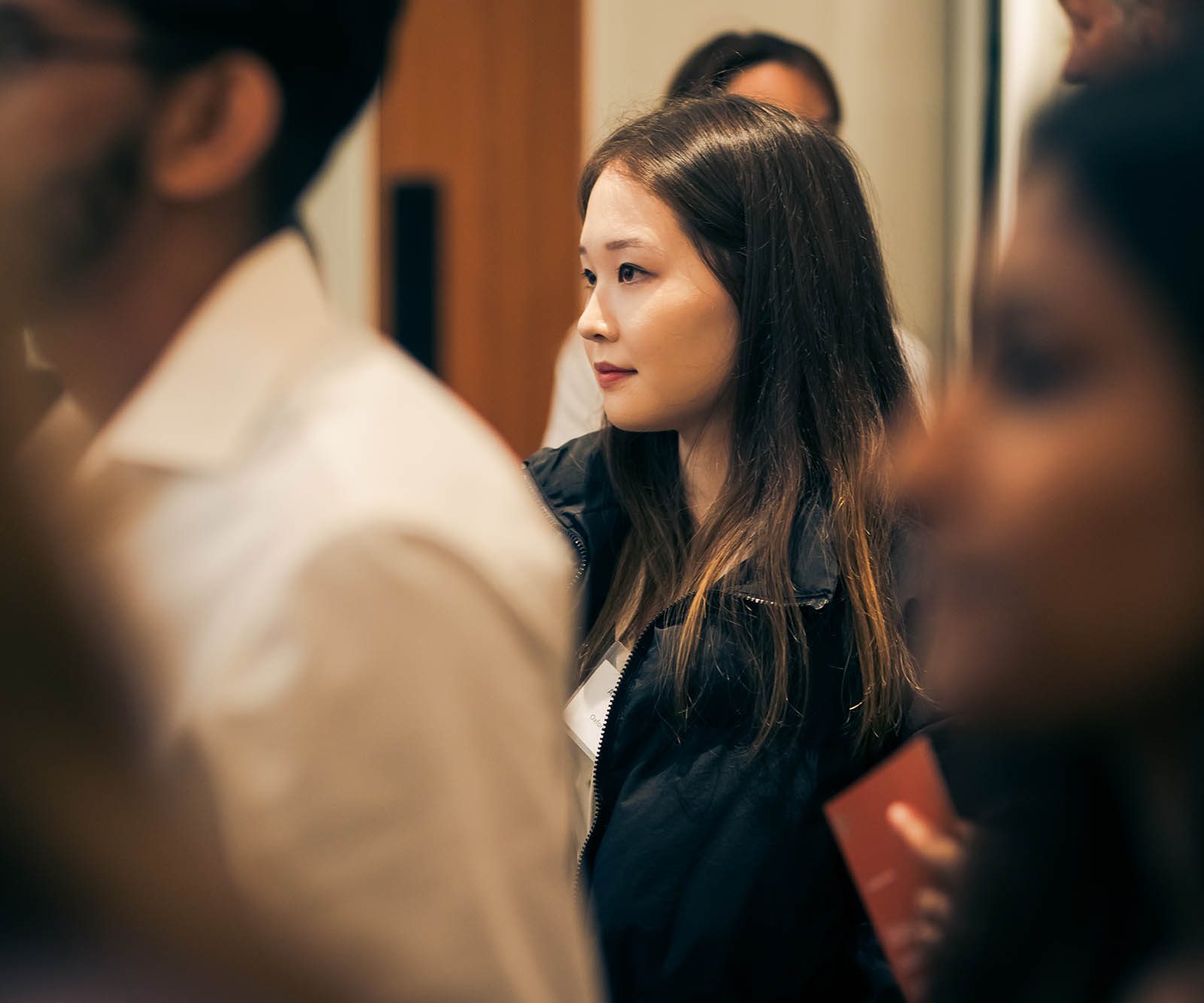 woman amongst a group of people
