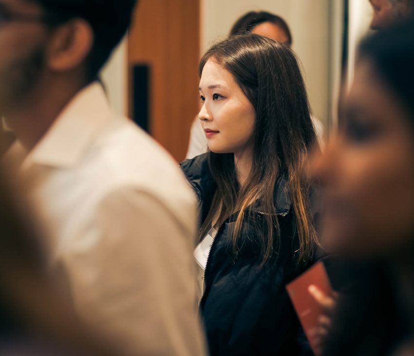 woman amongst a group of people