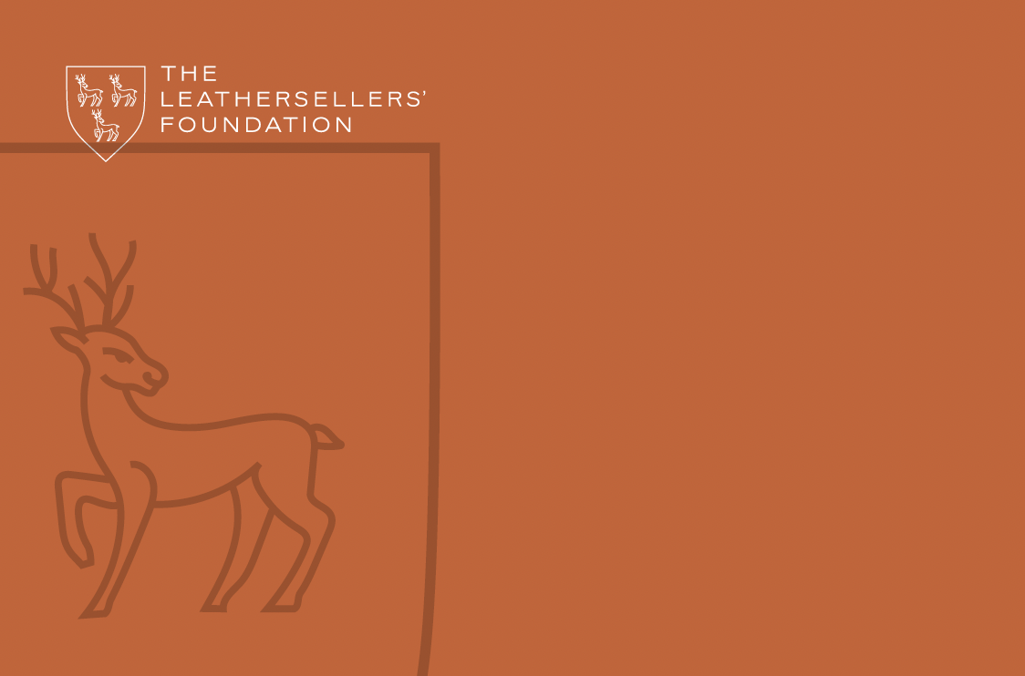 an outline of a roebuck on an orange background