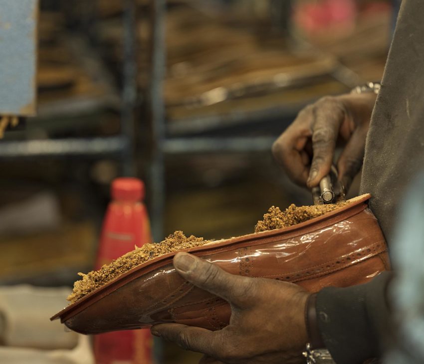 shoemaker working on a shoe