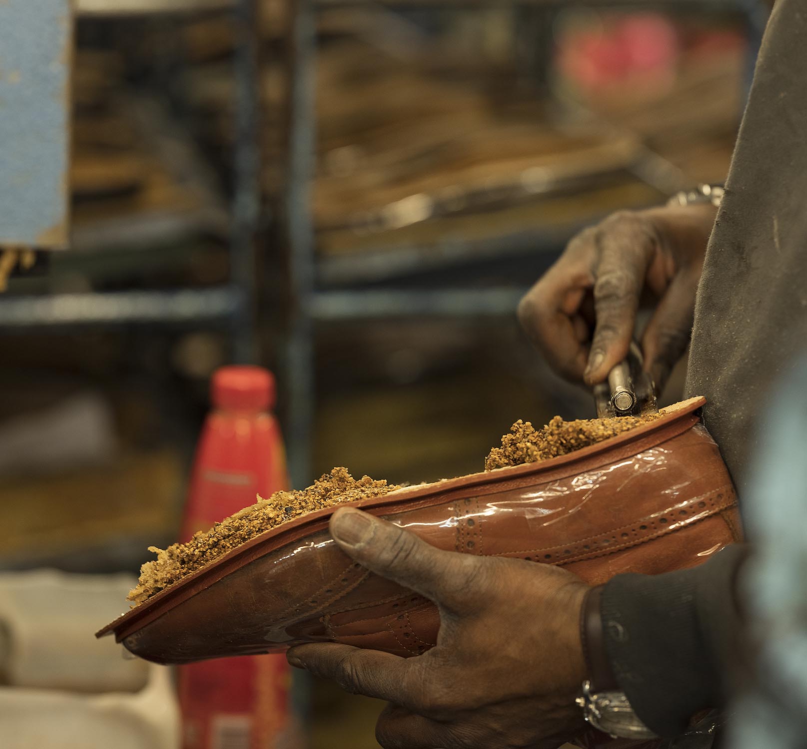 shoemaker working on a shoe