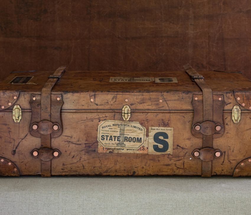 a leather cabin trunk