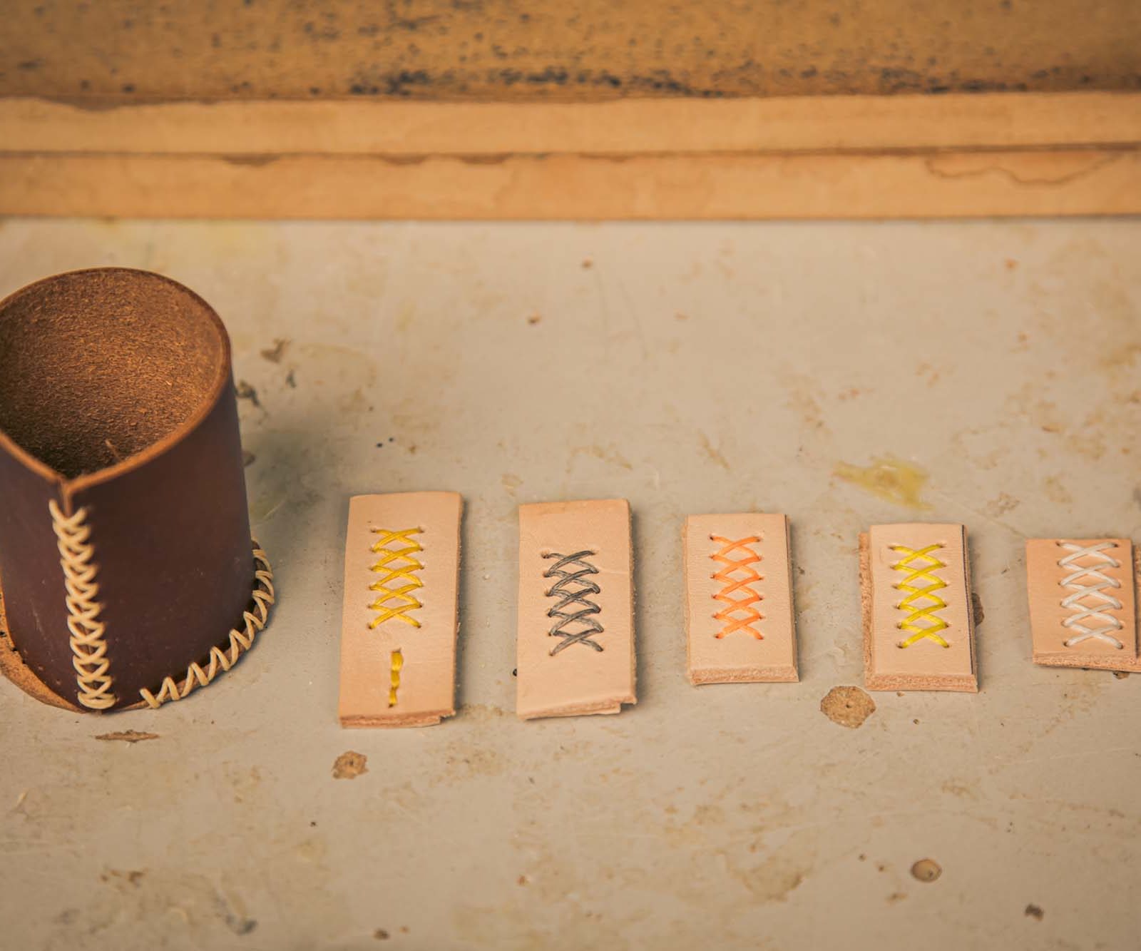 Leather pot and stitching samples